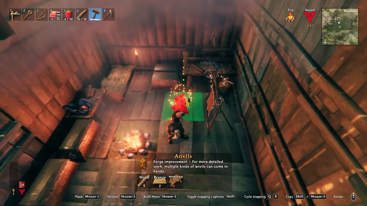 Anvils selected in the build menu with a green placement outline inside the workshop