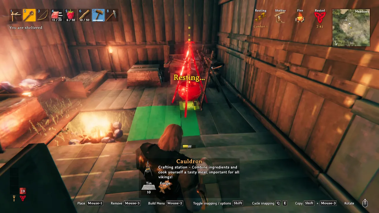 The build menu open inside the shelter, with a station preview positioned on the floor near the Forge.