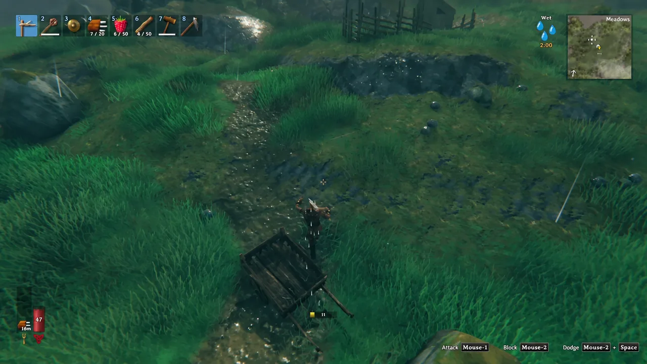 Player pulling a loaded wooden cart across the Meadows biome in Valheim