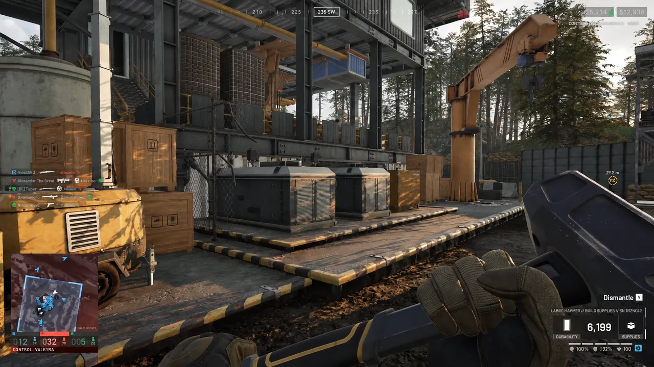 Hammer equipped with the dismantle prompt showing over build supplies