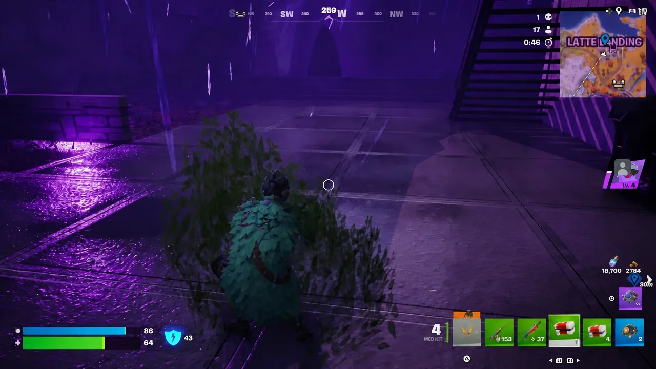 Med Kit selected in the quick bar while the player hides in a bush
