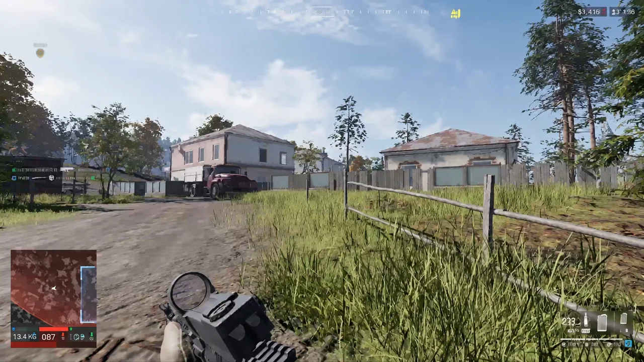 First-person player aiming a rifle while pushing through a residential area after a drop.