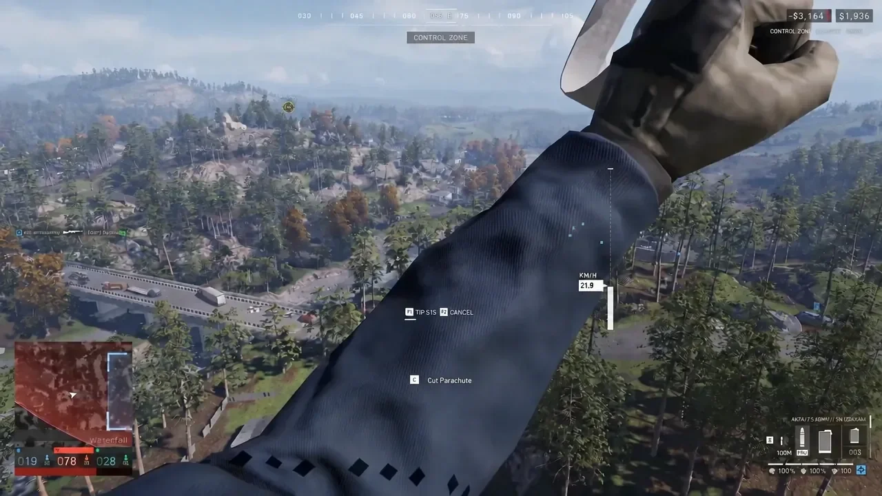 Descending under an open canopy over a Control Zone with the Cut Parachute prompt on screen.