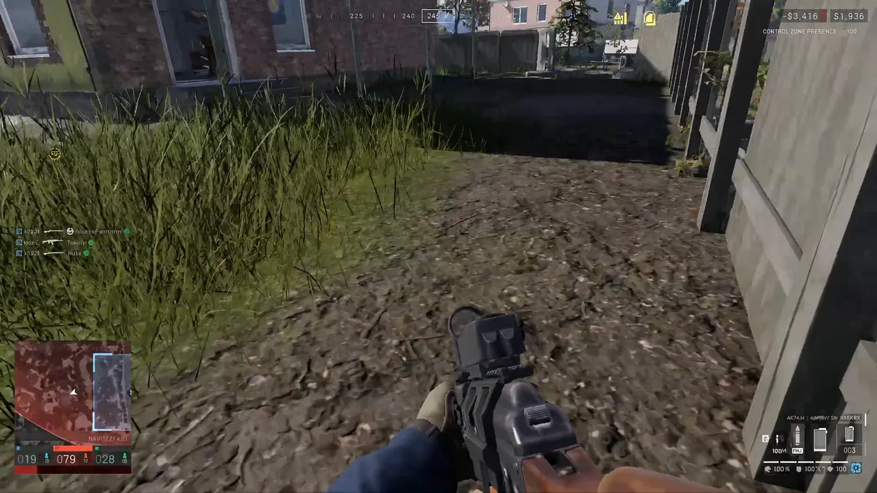 First-person view moving along the side of a building beside a grassy yard immediately after landing.