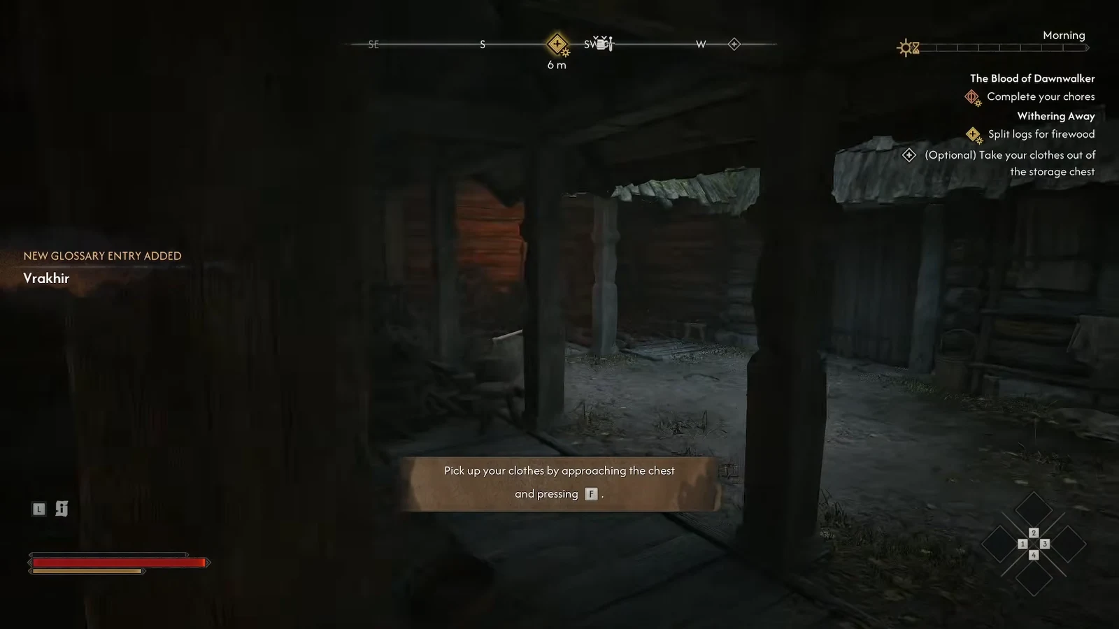 On-screen prompt telling the player to approach the chest and press F to pick up Coen's clothes