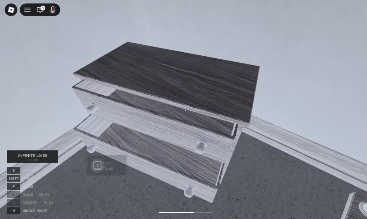 An open wooden drawer with the E Close prompt on screen
