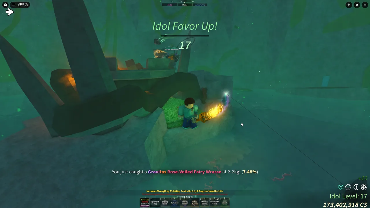 Catching a Gravitas Rose-Veiled Fairy Wrasse with the Idol Favor Up notification on screen