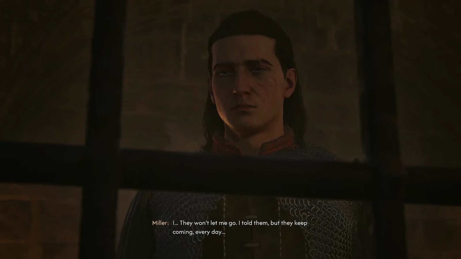 Mert speaking to Coen from behind the bars of his cell during The Firebrand