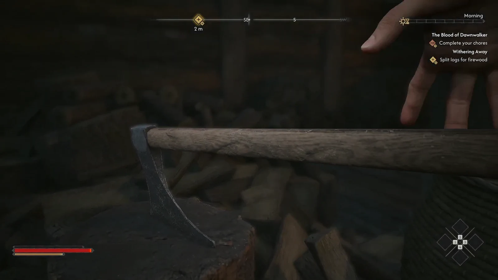 Coen bringing the axe down on a log during the firewood prompt sequence