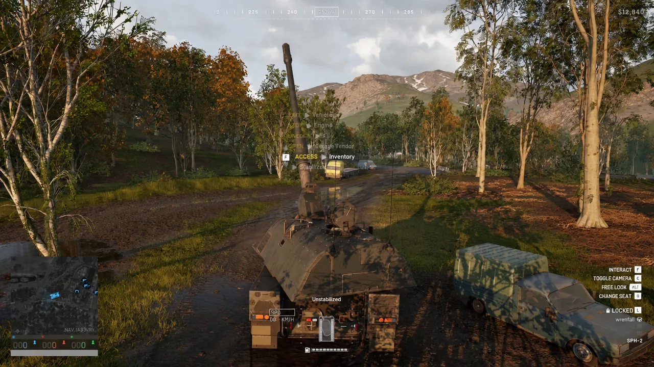 In-vehicle F interaction prompt highlighted on the WARDOGS gameplay HUD