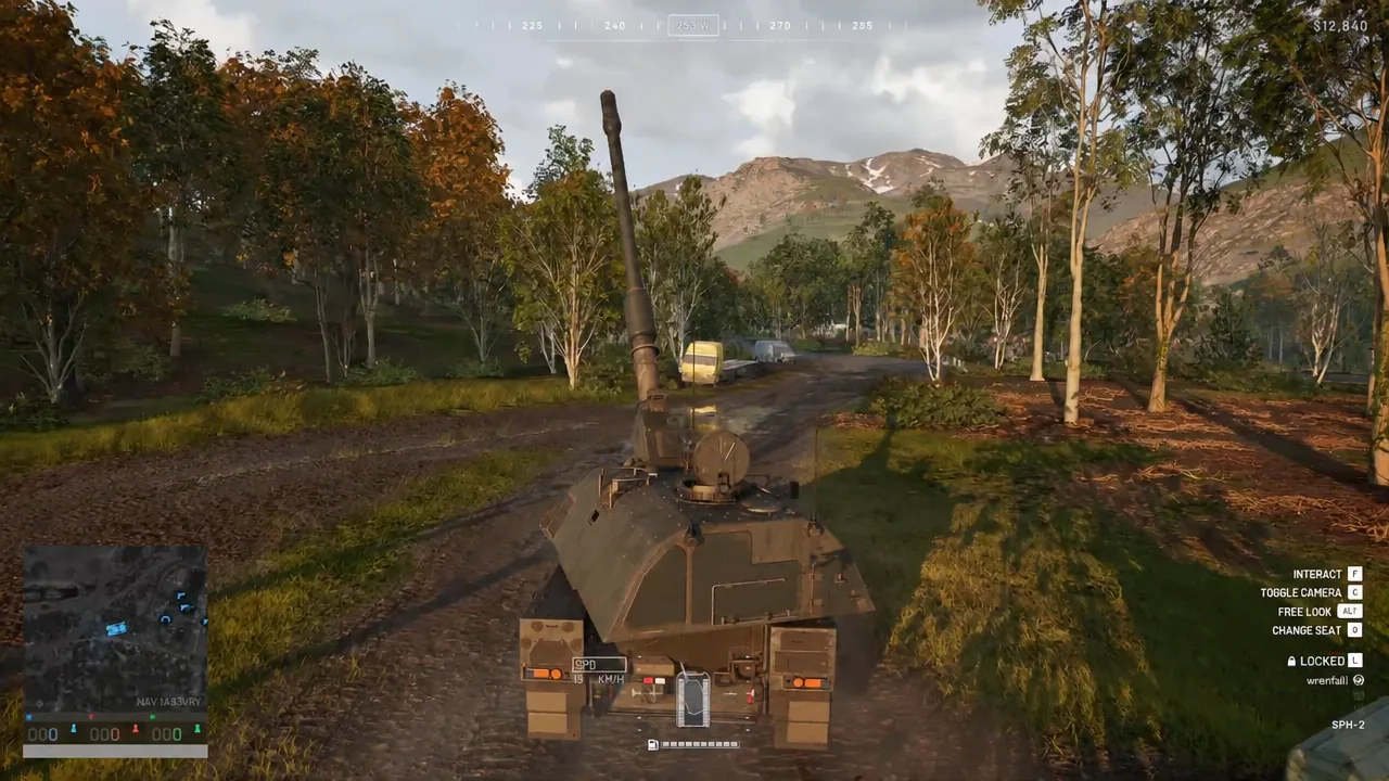 Third-person view of an armored vehicle with the camera, free look and seat change prompts on the right