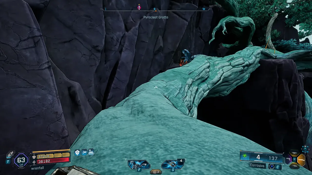 Crosshair aimed along a giant tree root being used as a climbing path in Pyroclast Grotto