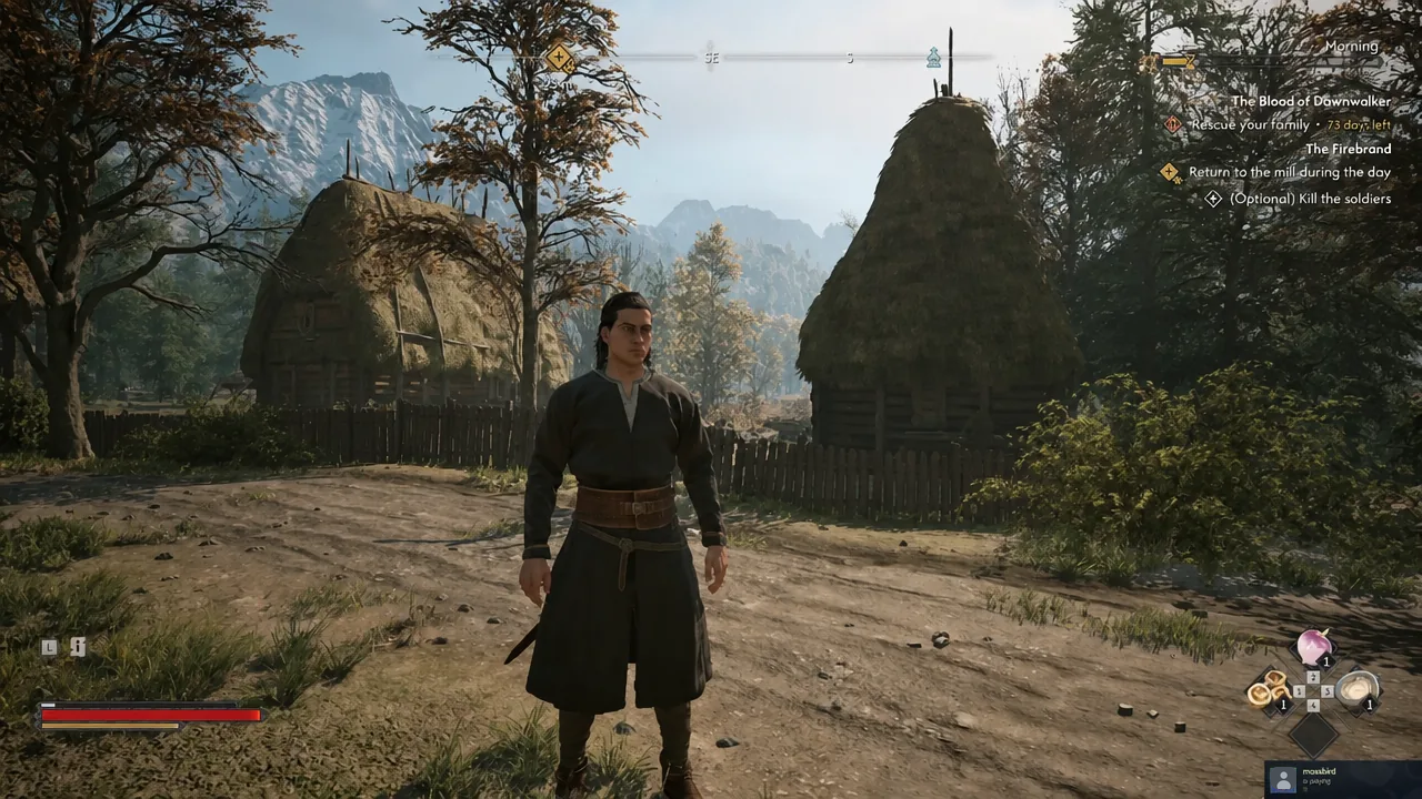 Coen standing in a village with the Rescue your family objective shown in the quest tracker