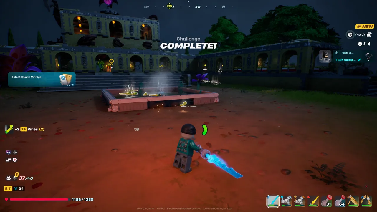 Challenge COMPLETE! banner appears after finishing the Defeat Enemy Minifigs objective in a Gotham City location