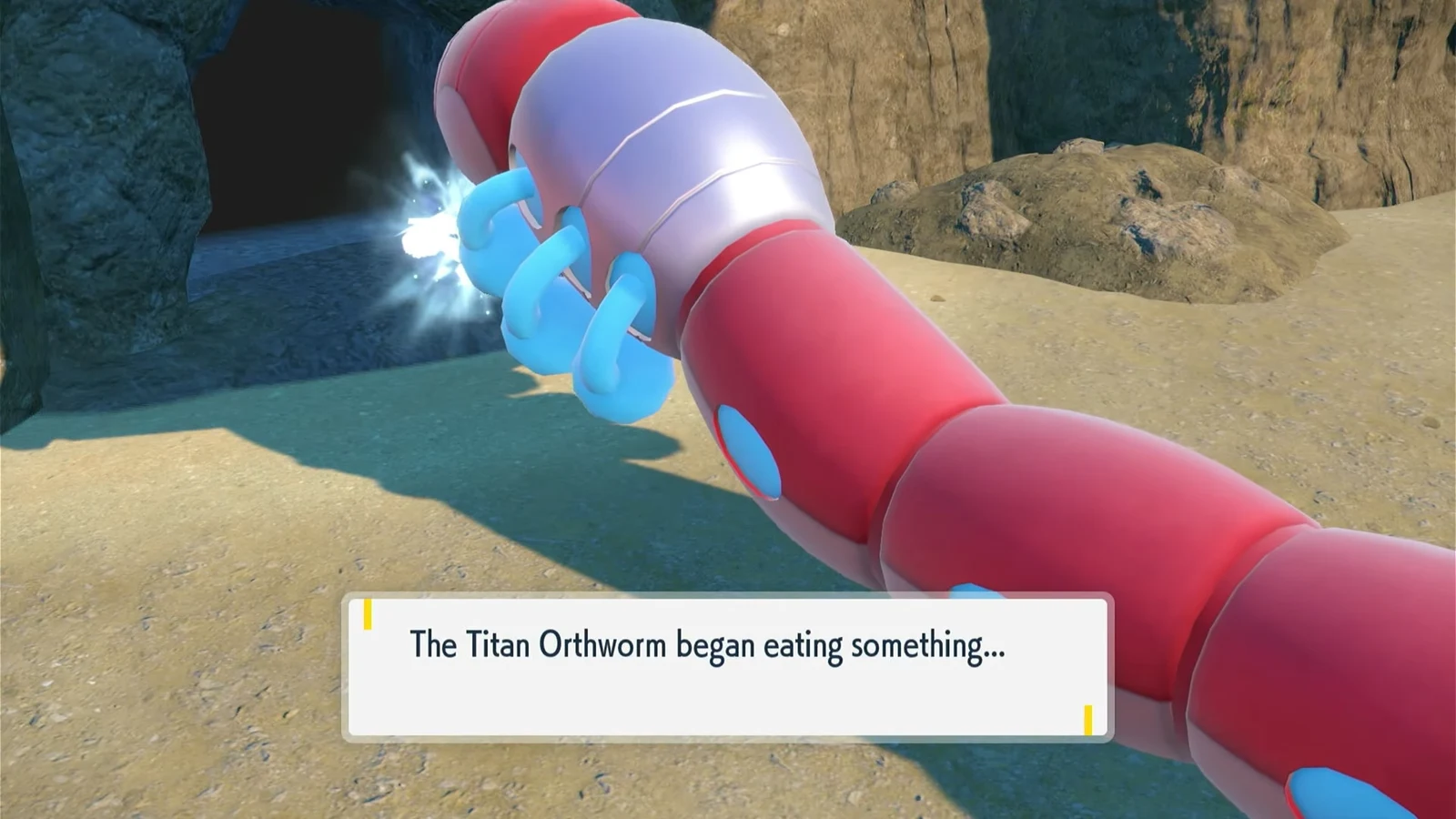 On-screen message reading The Titan Orthworm began eating something as it restores its health