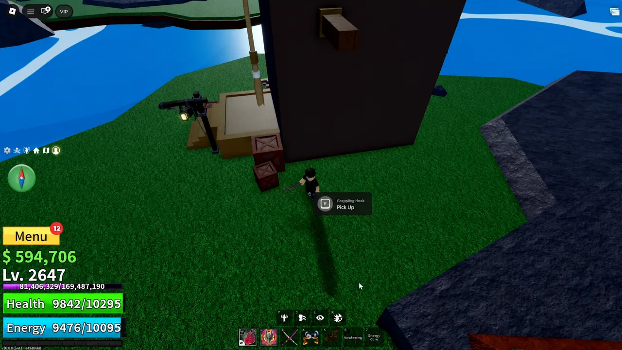 The Grappling Hook lying on the ground with an E Pick Up prompt displayed above it