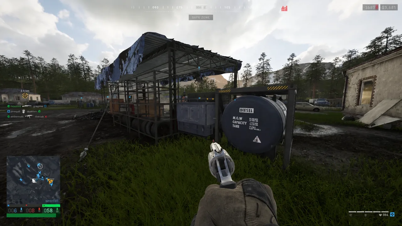First-person view aiming a revolver at a diesel fuel tank inside the Safe Zone
