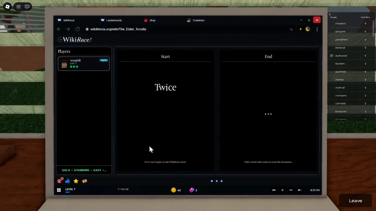 WikiRace laptop screen showing the starting article Twice while the target article panel loads
