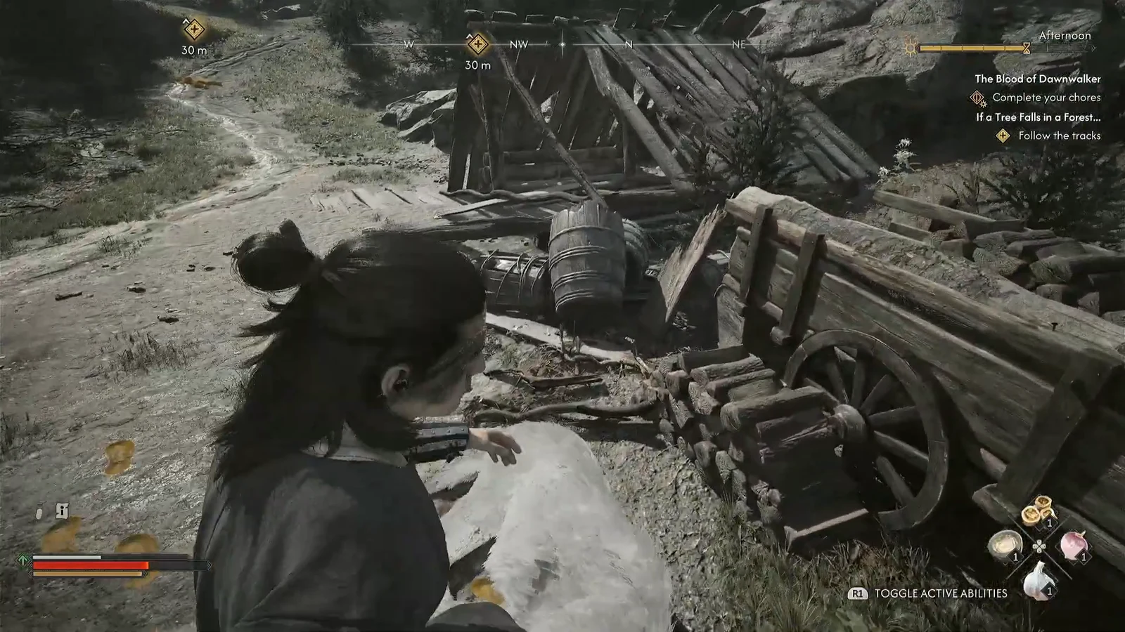 Coen examining scattered debris beside a broken cart with the Follow the tracks objective on screen