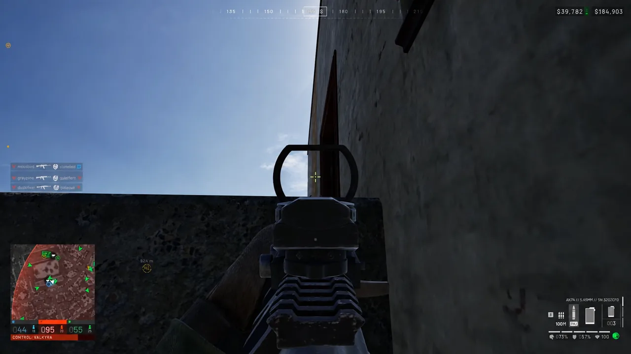 Aiming down a holographic sight from behind cover in WARDOGS
