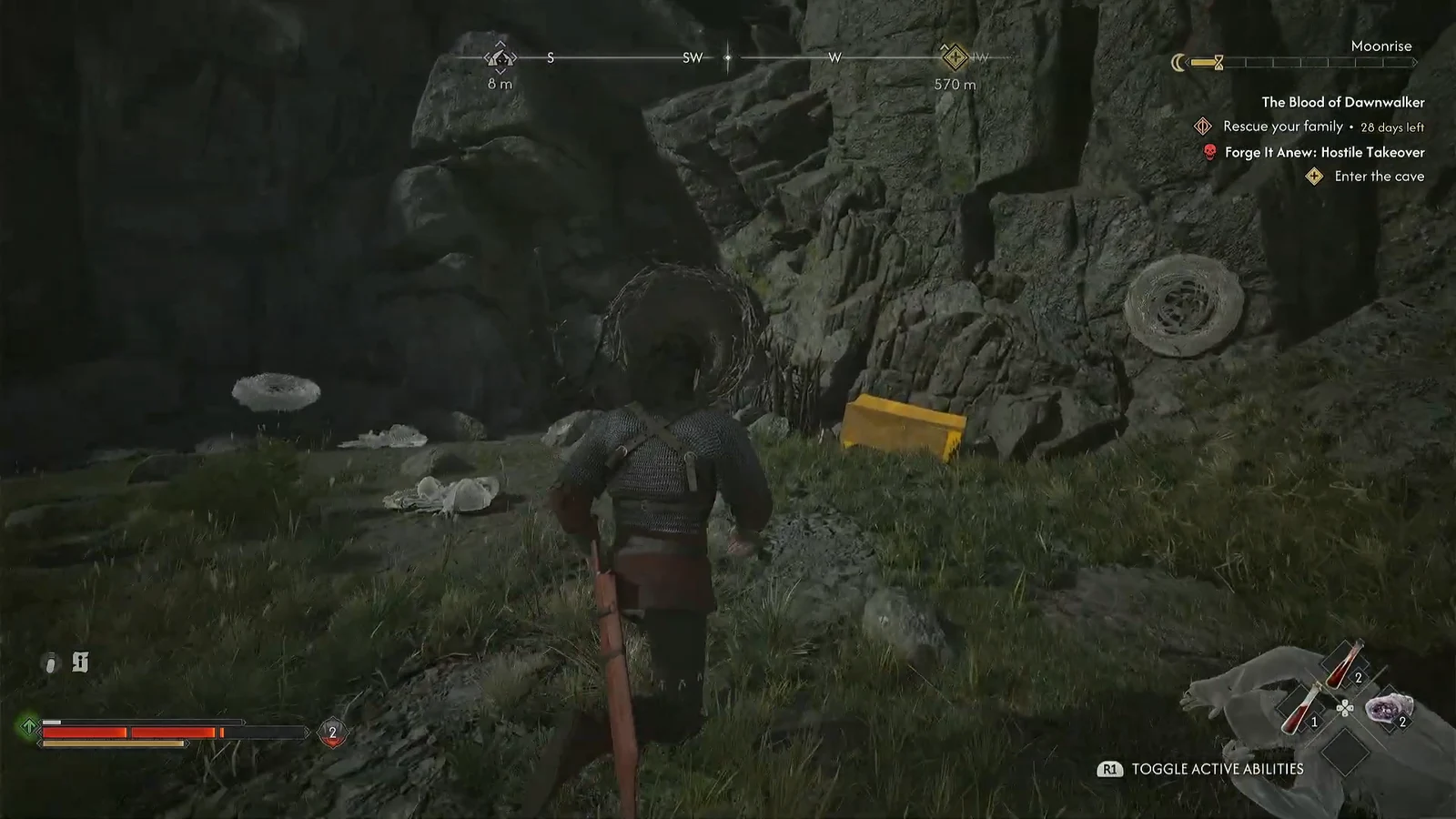 The highlighted yellow chest tucked against the rock wall by the Kobold's Nest entrance