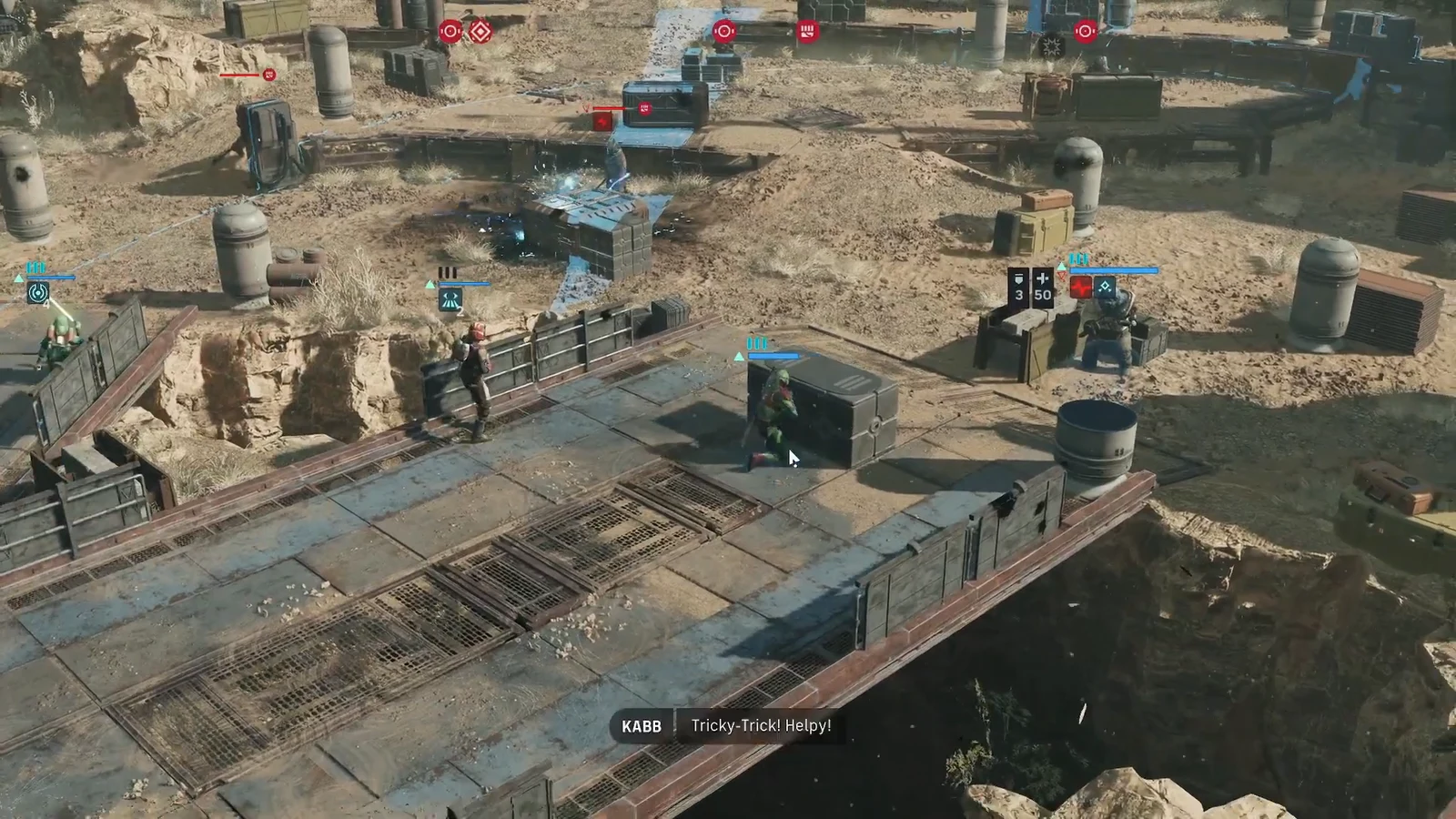 Squad member crouched behind a black crate while allies trade fire across the desert industrial yard