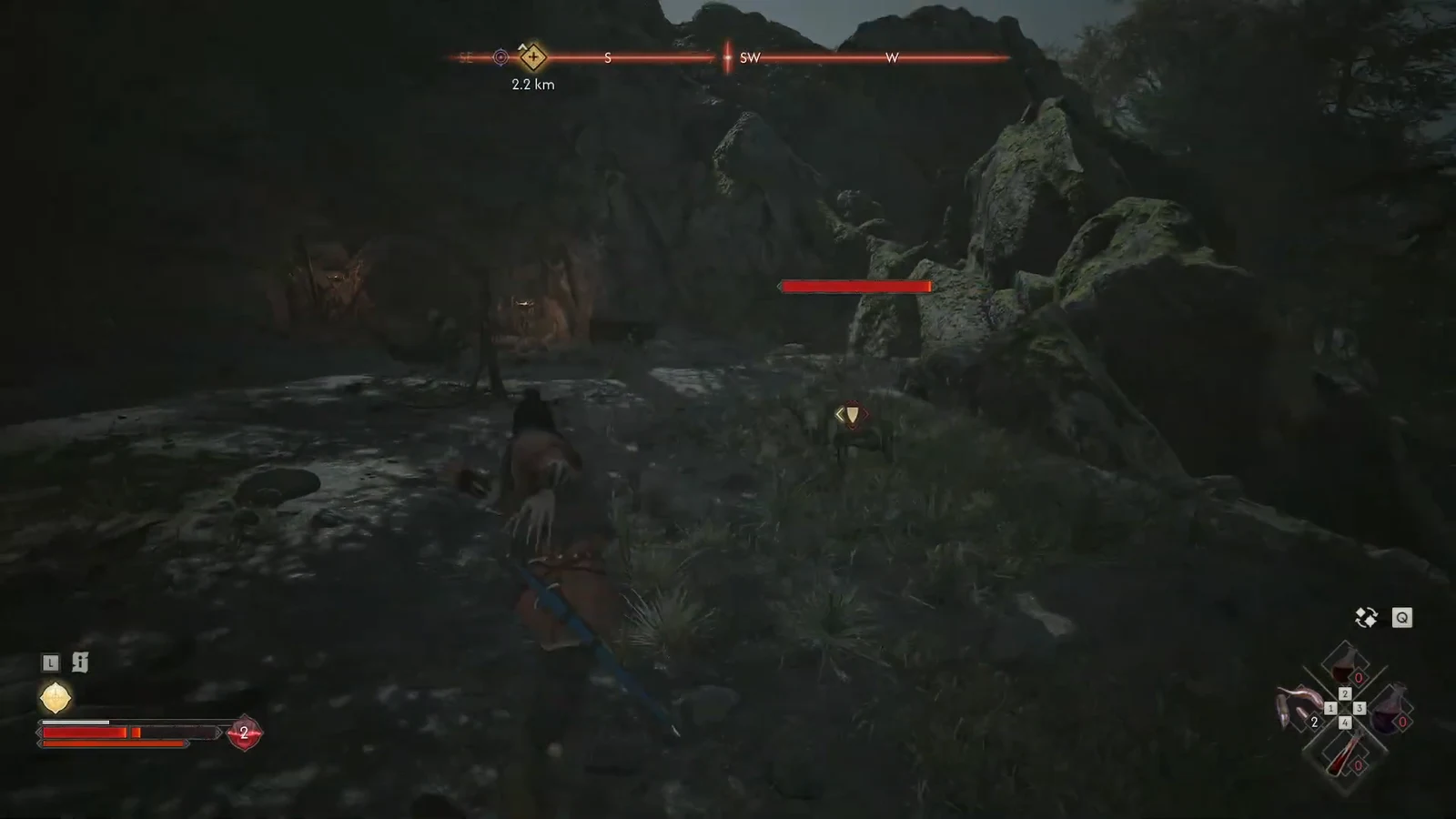 Player closing in on a Kobold marked with a red health bar as the objective compass reads 2.2 km southwest