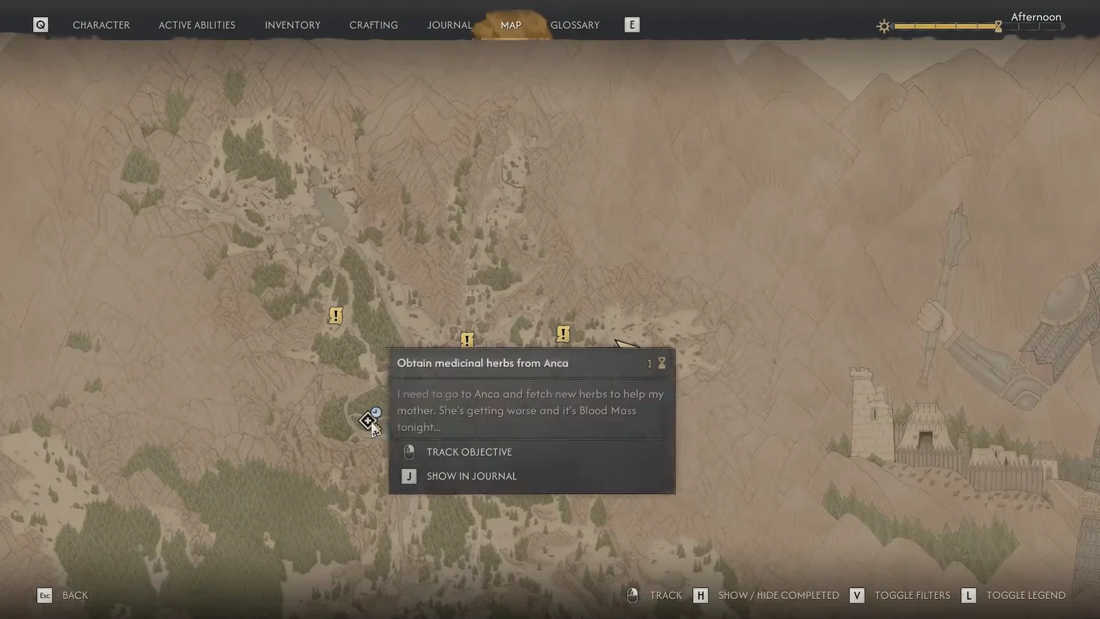 Map screen showing an objective panel with tracking and journal options for the selected marker