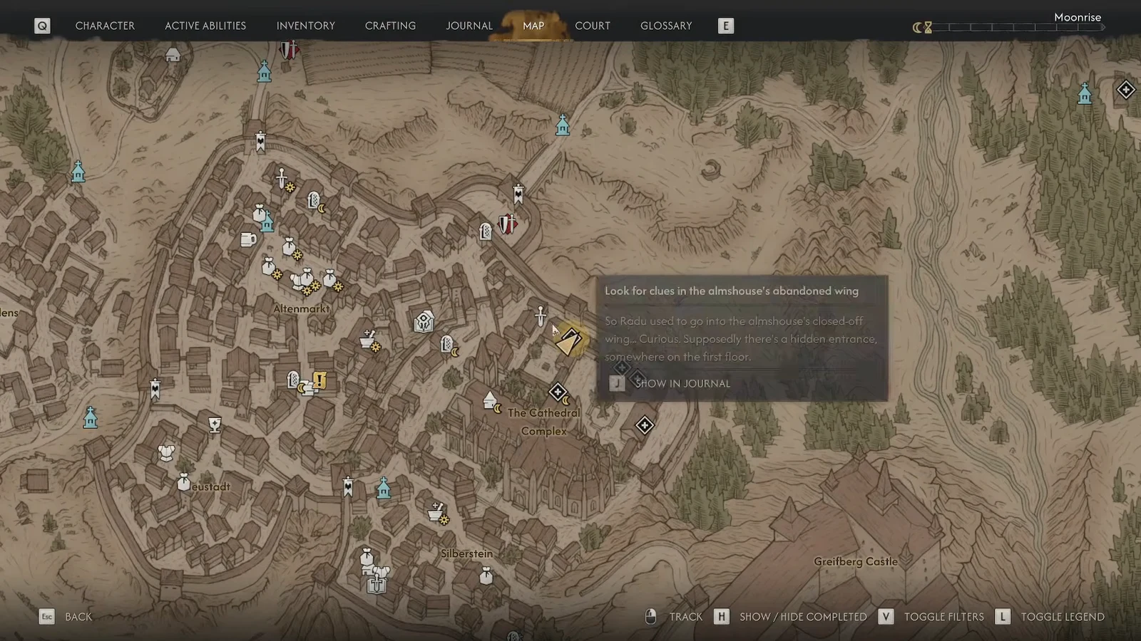 Map screen with the A Dubious Gift objective tooltip open, pointing to the almshouse