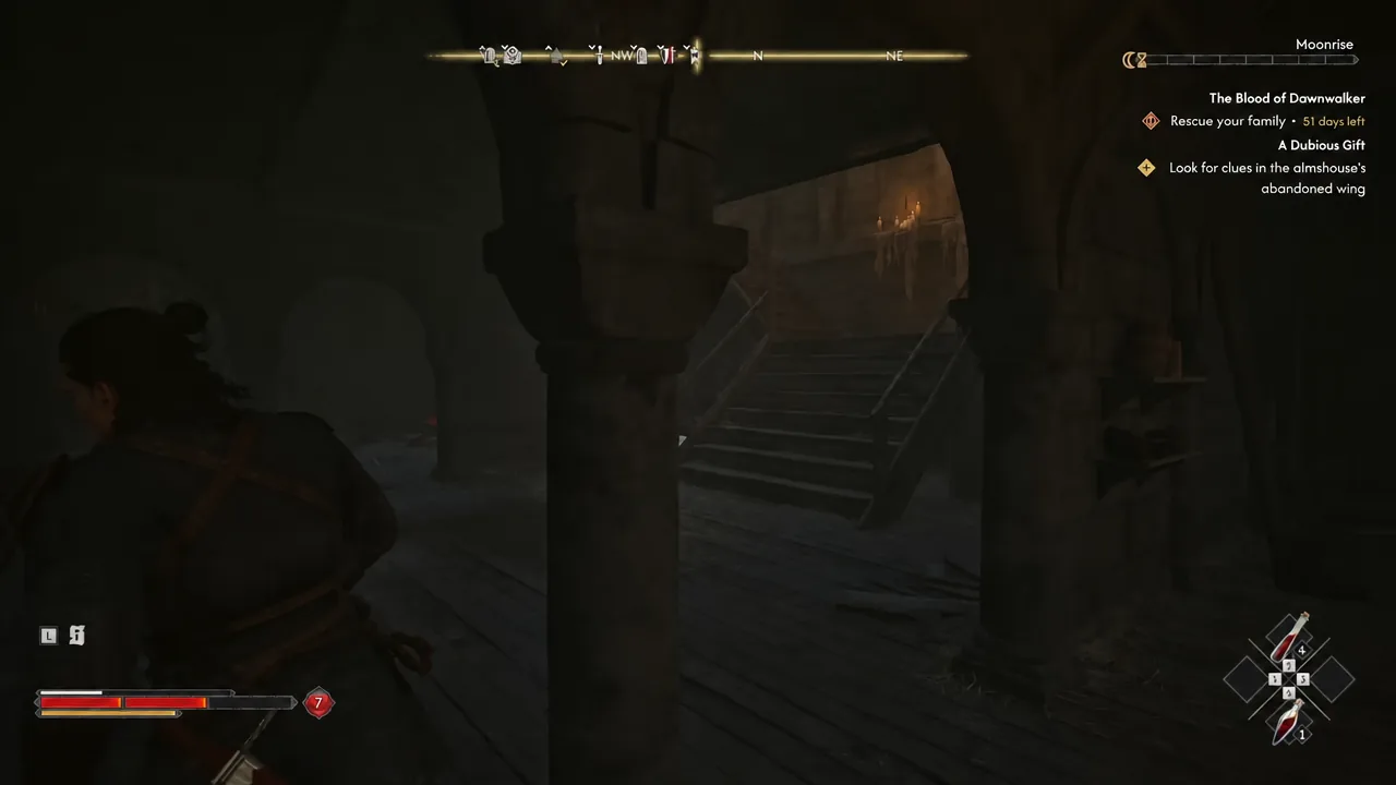 Coen exploring the candlelit almshouse interior with the abandoned wing objective on screen