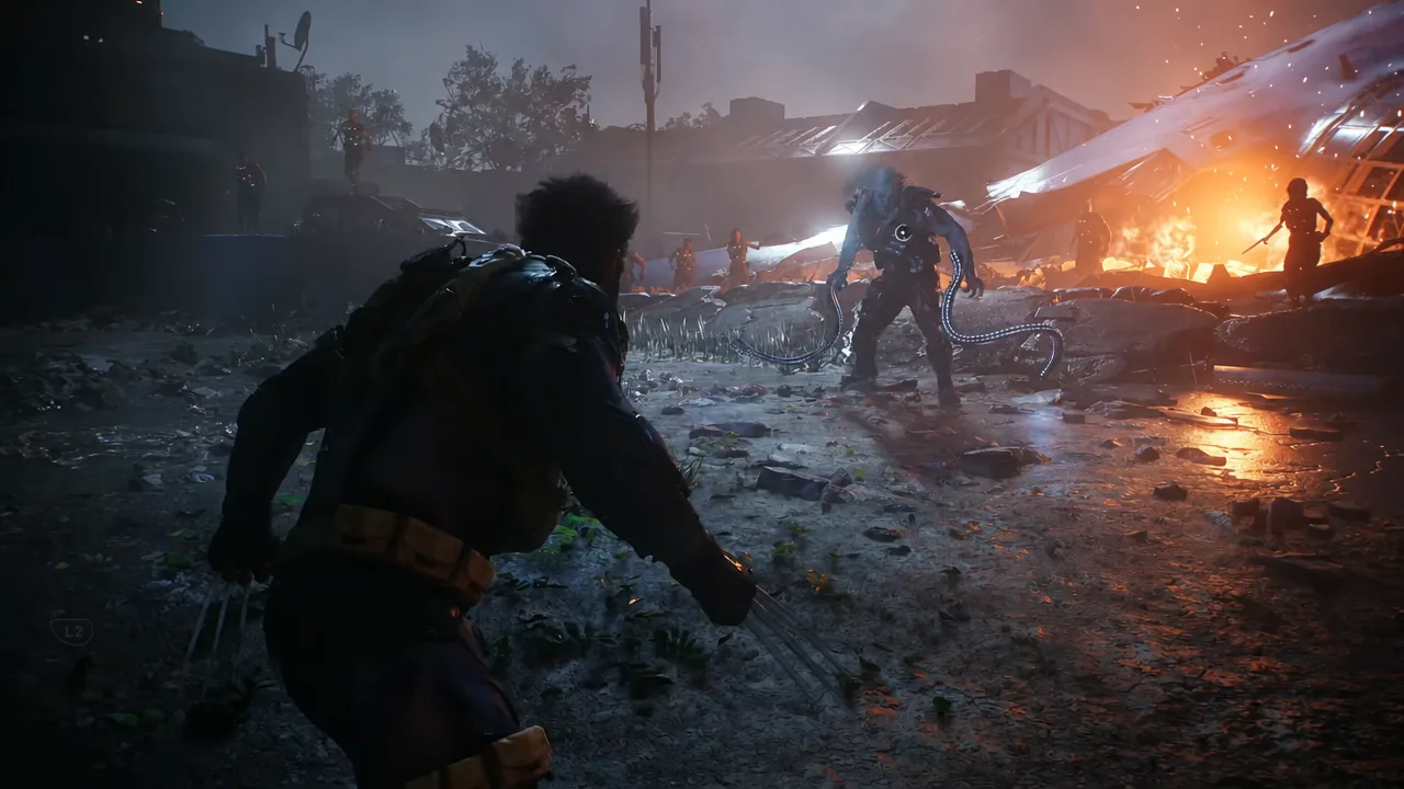 Wolverine facing Omega Red in burning crash wreckage with an L2 button prompt on screen