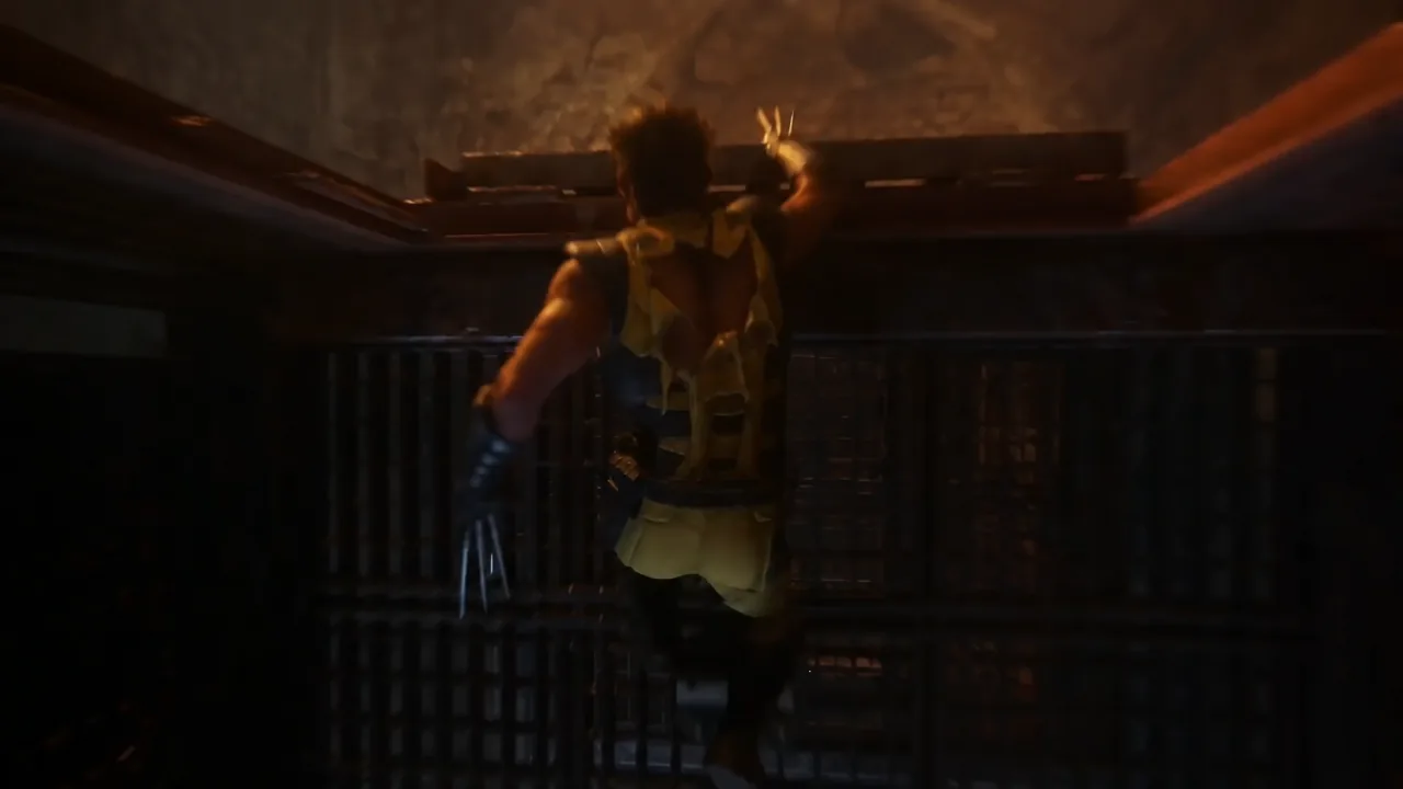 Logan climbing a dark industrial shaft toward an overhead ledge