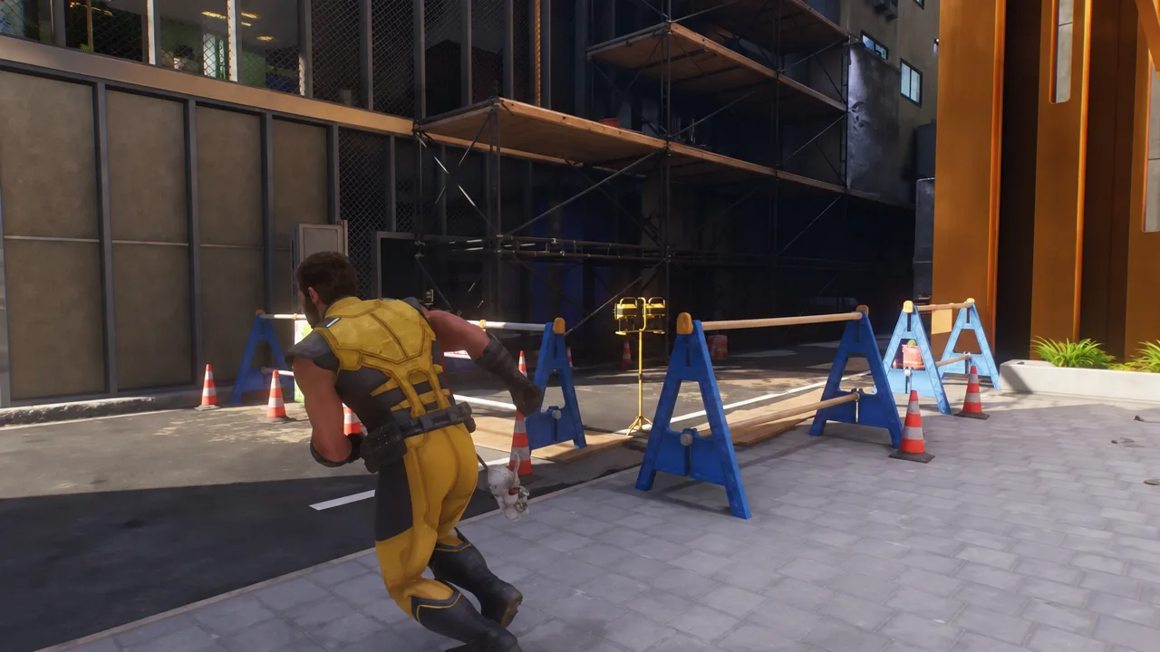 The alley beside Jean leads to the scaffolding crate.