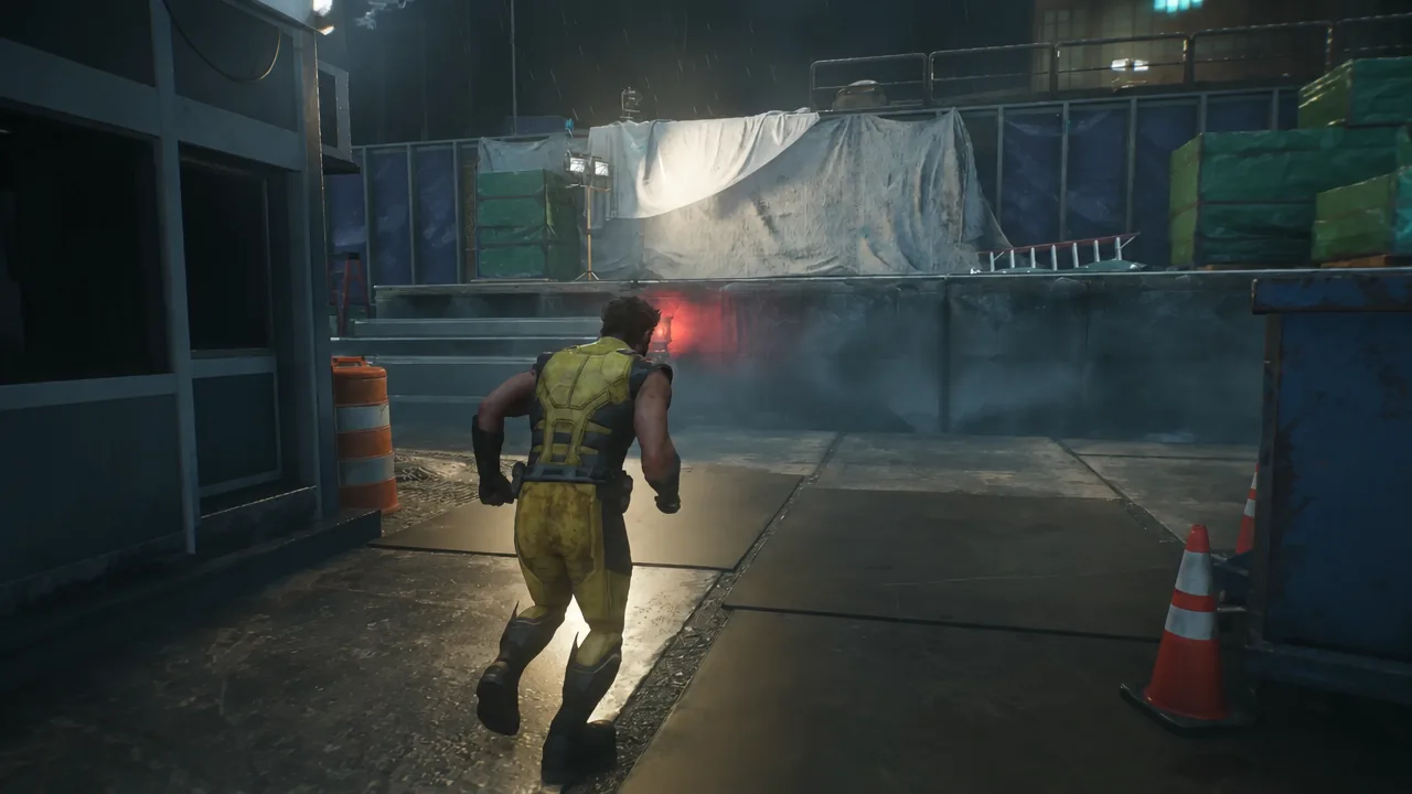 Logan running through a rainy construction yard past pipes and machinery
