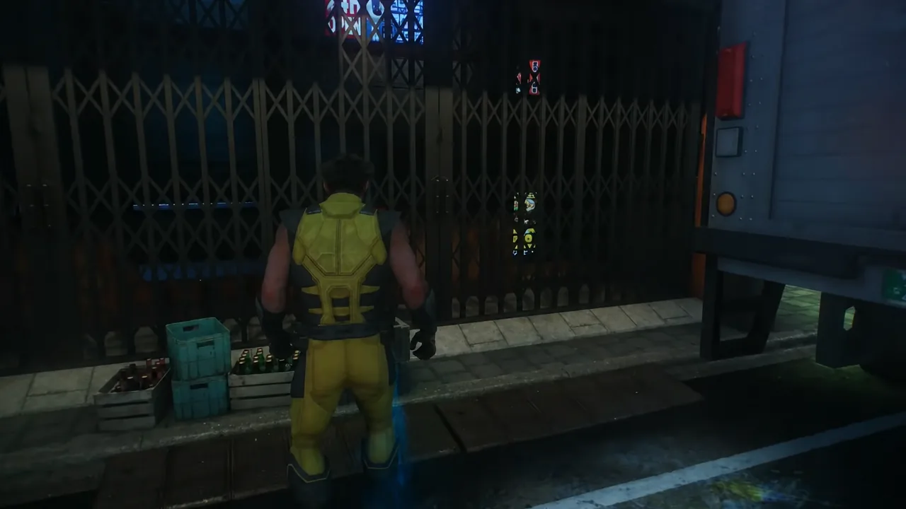 A closed gate with a control panel beside it on the route through We Were Wrong