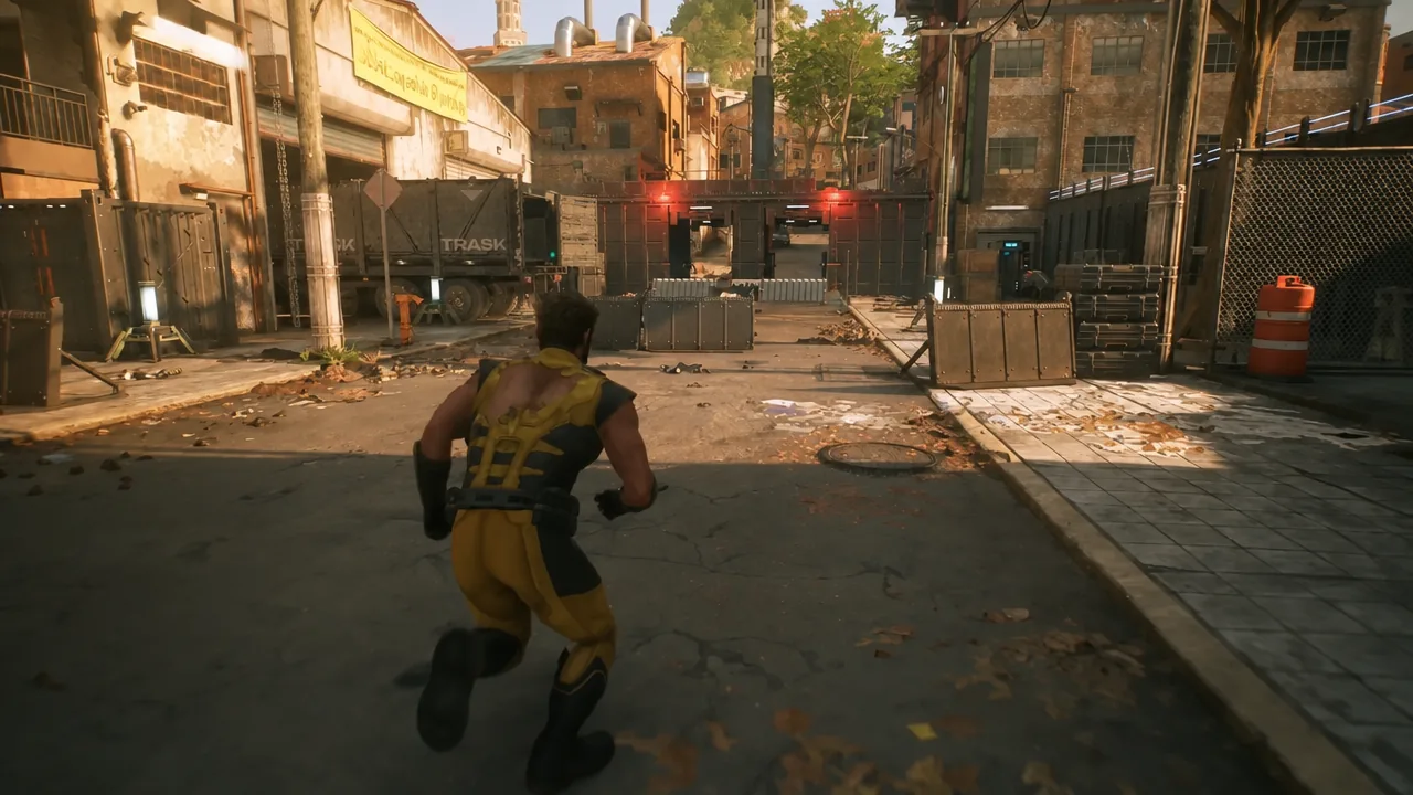 Logan running toward street barricades on the side road leading to the third truck