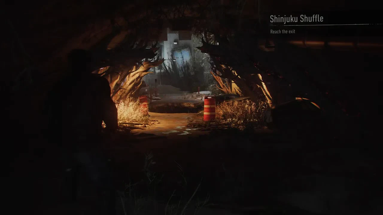 Overgrown tunnel at the start of the trial with the Reach the exit objective on screen