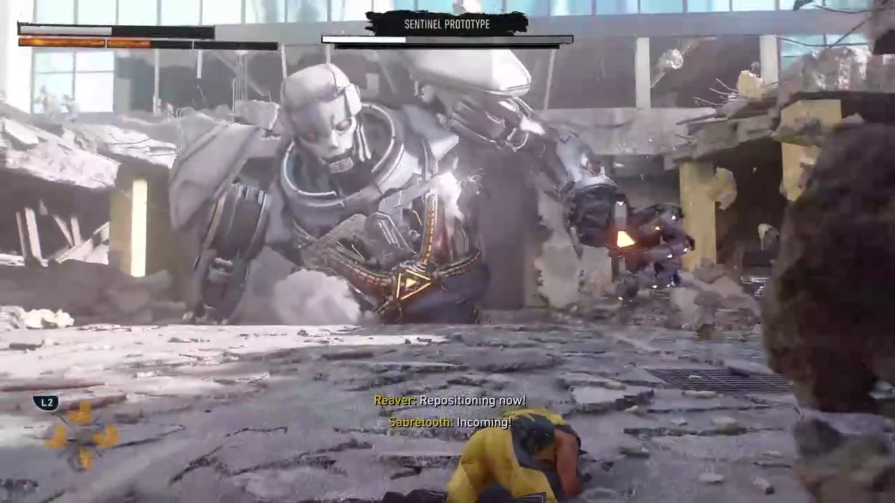 Wolverine sliding behind a flipped truck as the Sentinel Prototype charges an energy blast