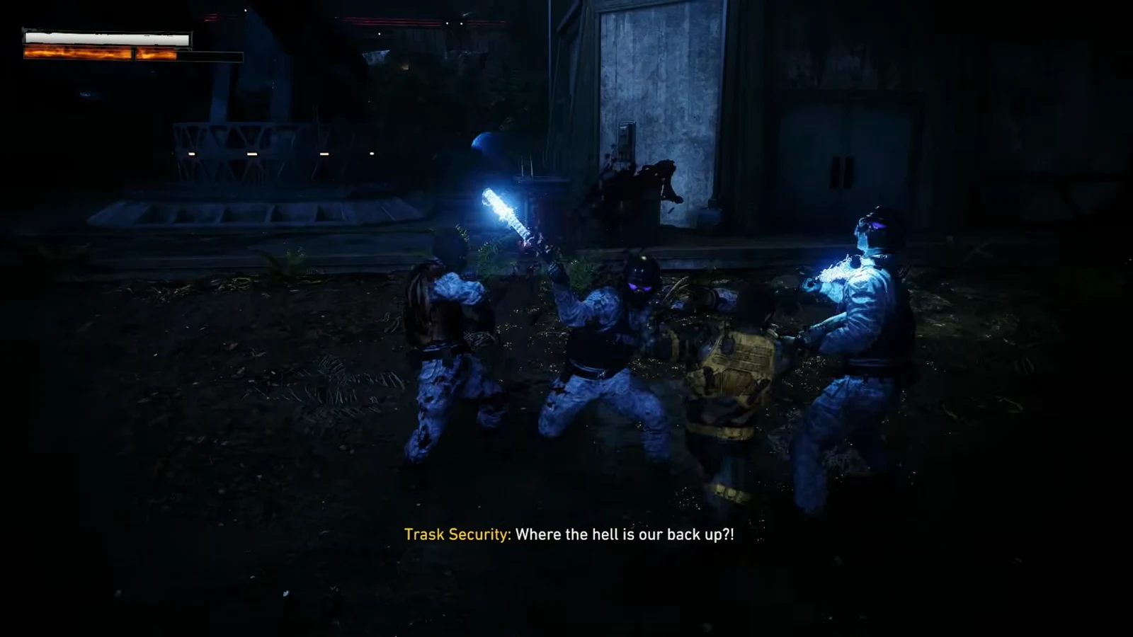 Logan and allies fighting Trask Security soldiers in a dark industrial section of the outpost