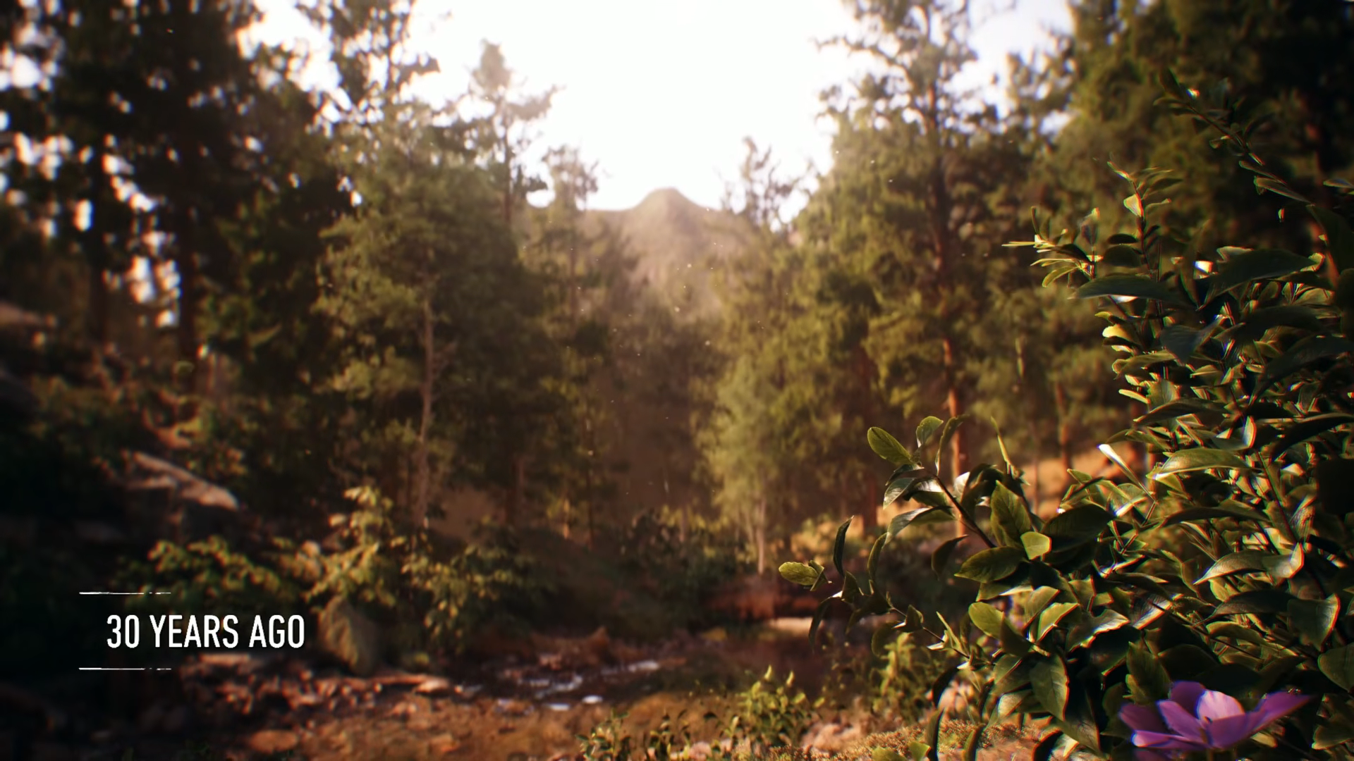 Feral Logan in a forest as Nathaniel Essex approaches during the 30 Years Ago flashback