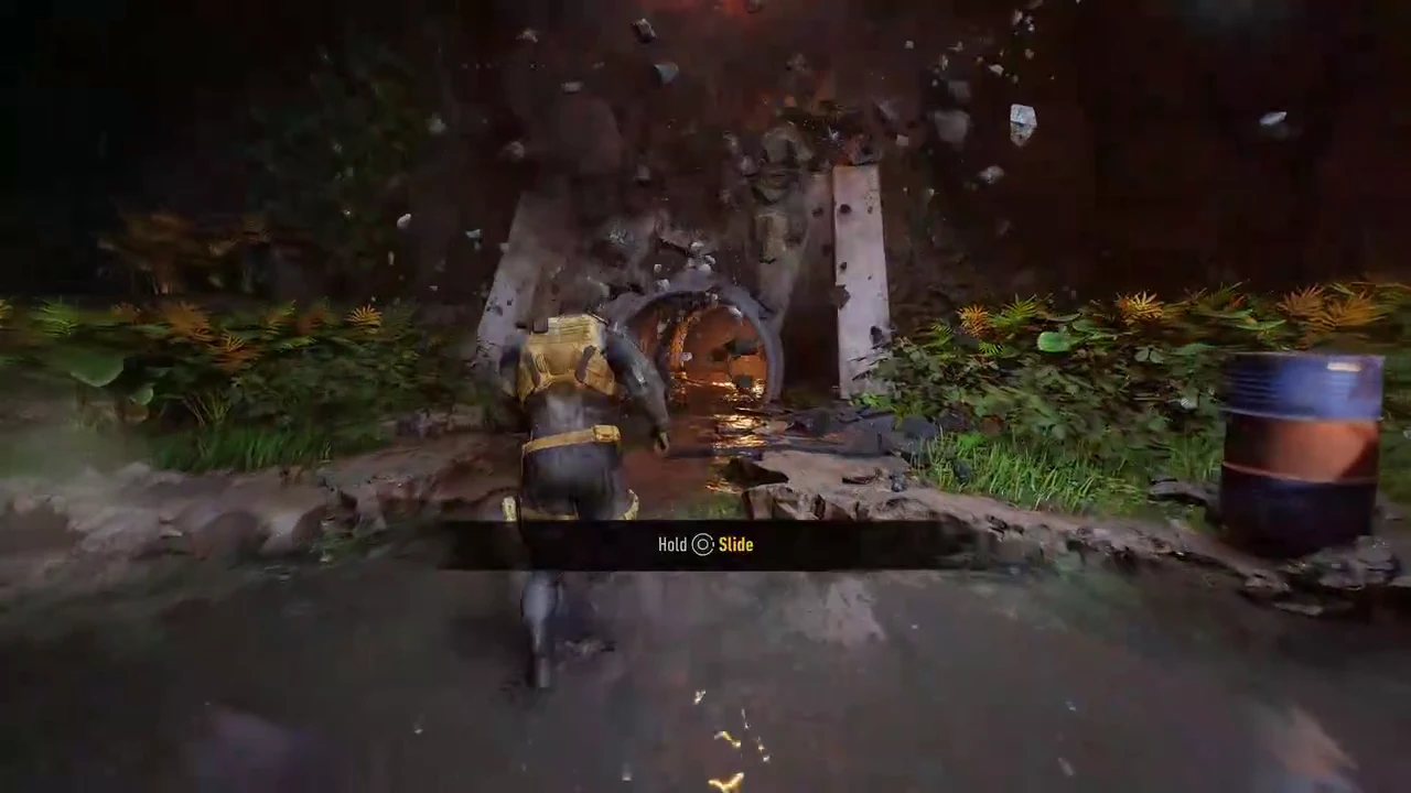 The Hold Circle slide prompt appearing as Logan approaches a low tunnel opening