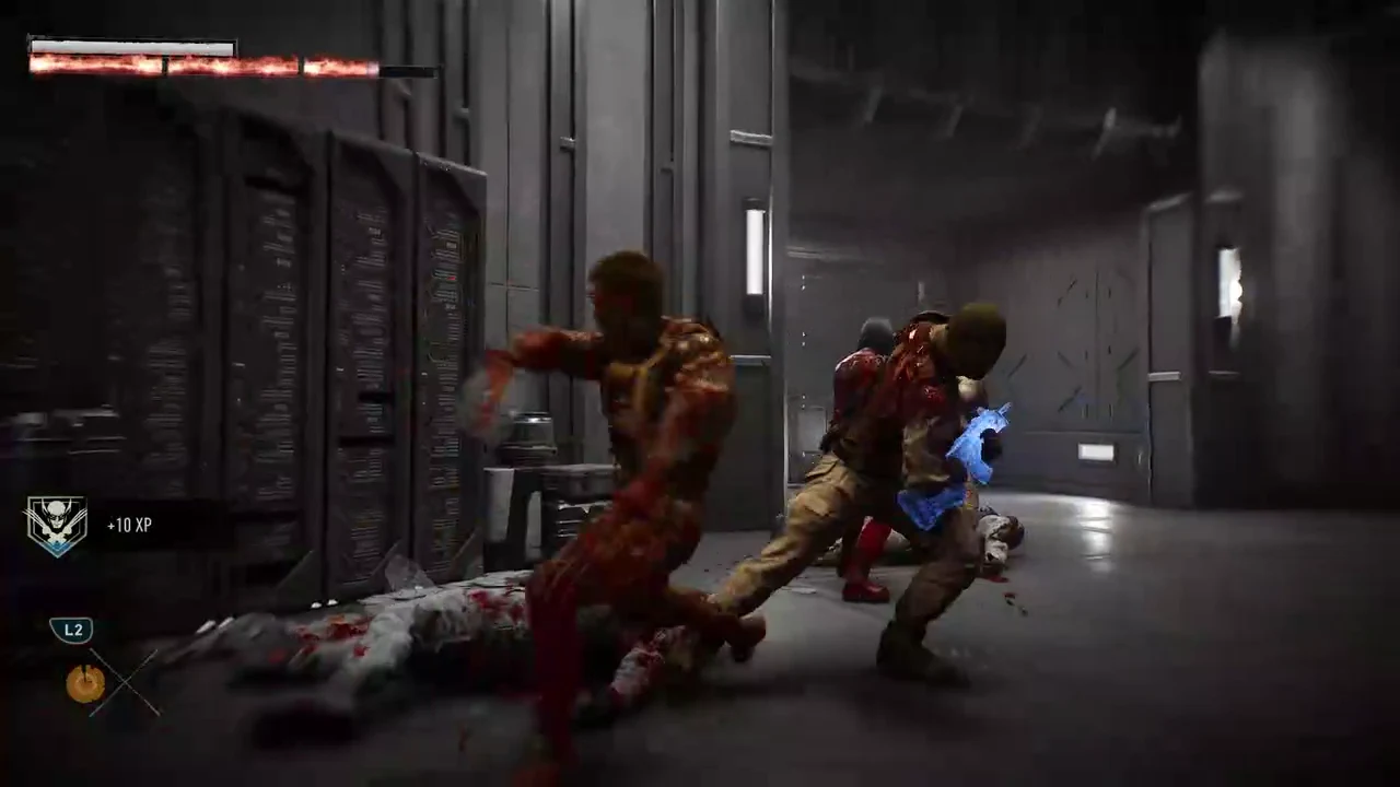 Logan kicking an enemy in a dark server room with an XP pop-up on screen