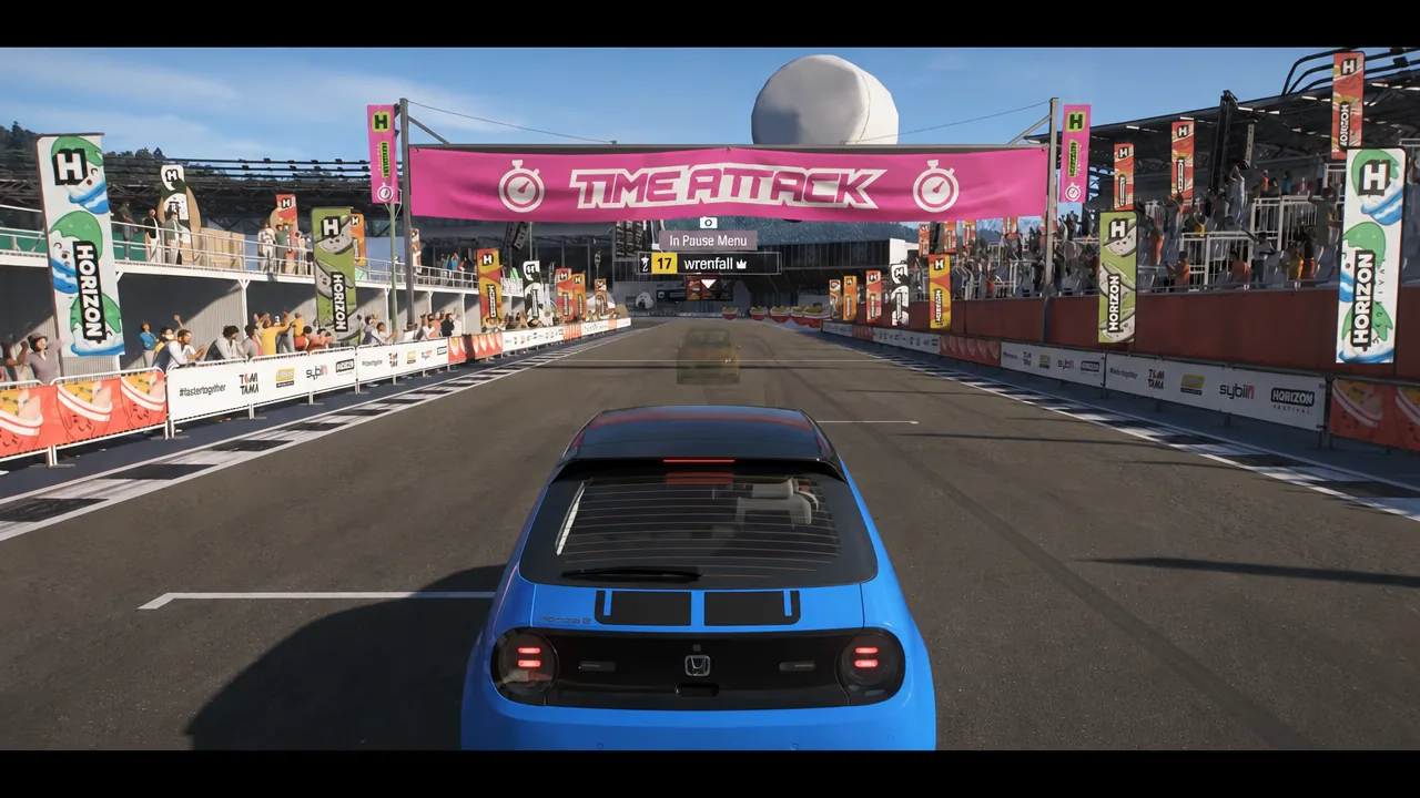 Car sitting on the Time Attack starting grid with the event banner and leaderboard on screen