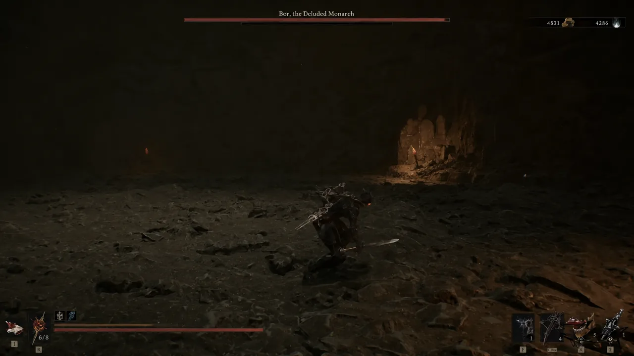 Boss encounter against Bor, the Deluded Monarch inside a dark cavern