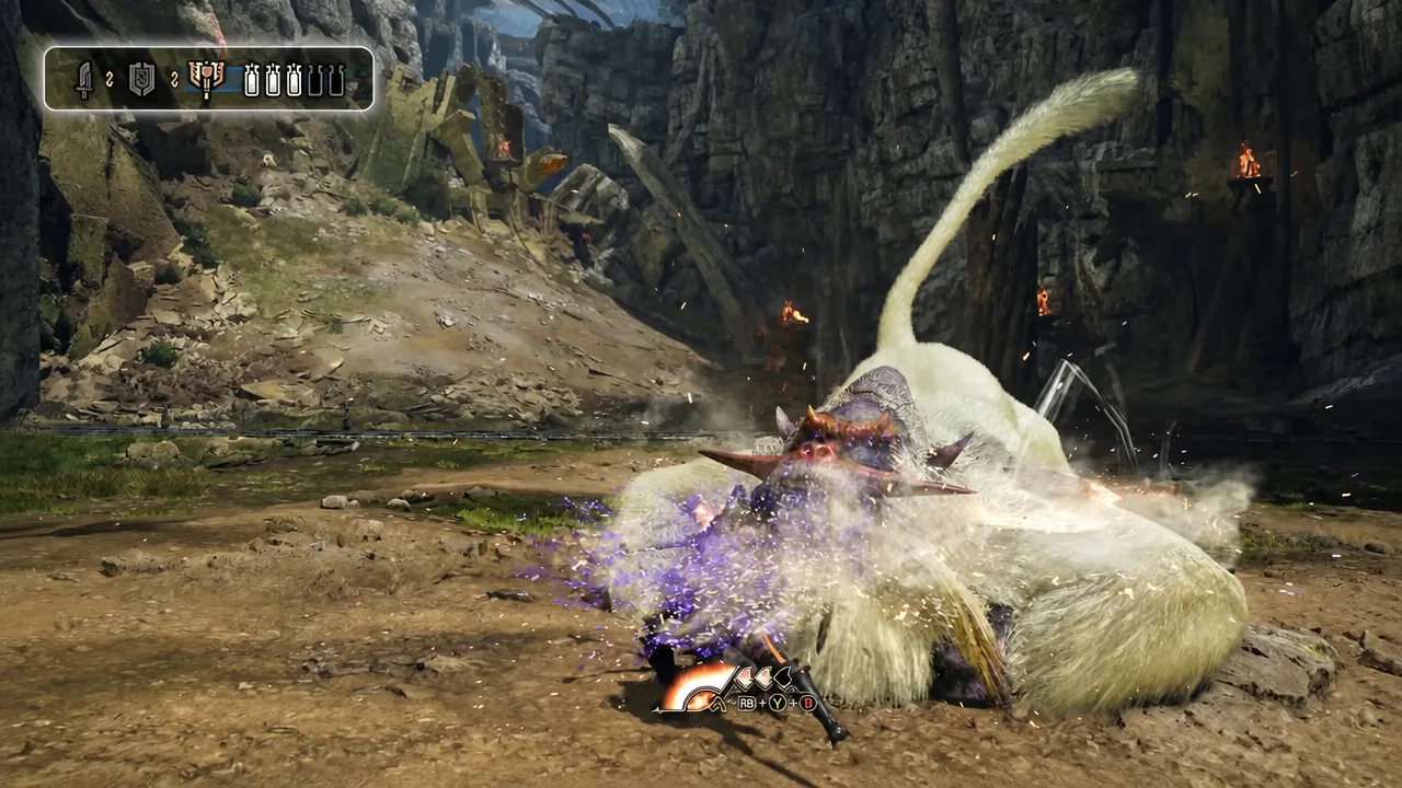 Combat HUD showing the RB plus Y plus B prompt during an axe attack on a large white monster