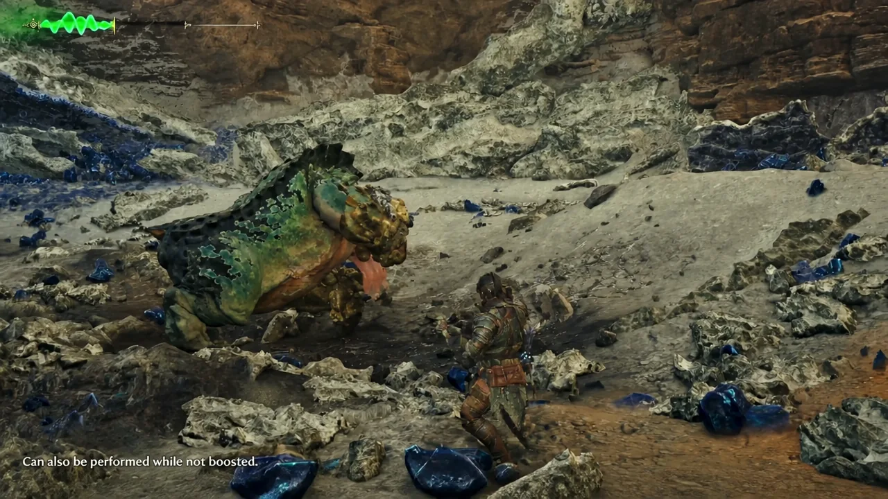 Sword and Shield attack in a rocky cavern with an on-screen tip reading Can also be performed while not boosted