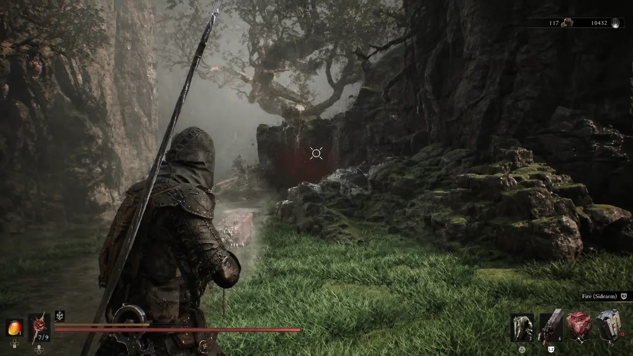 Aiming a sidearm down the path leading toward the Alchemist's Workshop