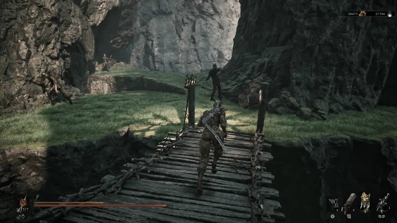 Player character crossing a wooden bridge toward enemies below Castigator's Keep