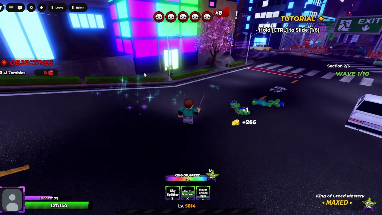 Tutorial prompt telling the player to hold CTRL to slide