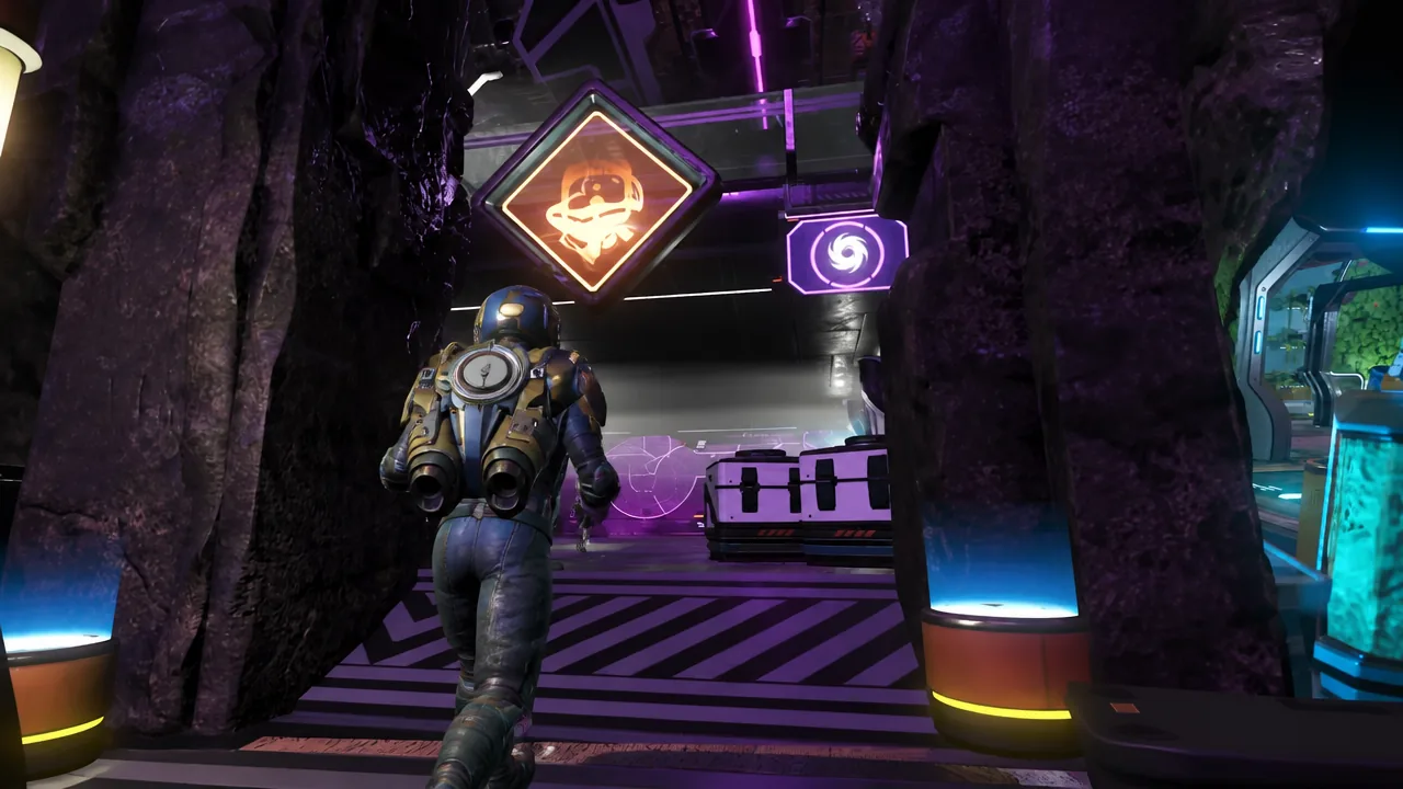 Astronaut walking toward a black storage container under glowing orange and purple station signage
